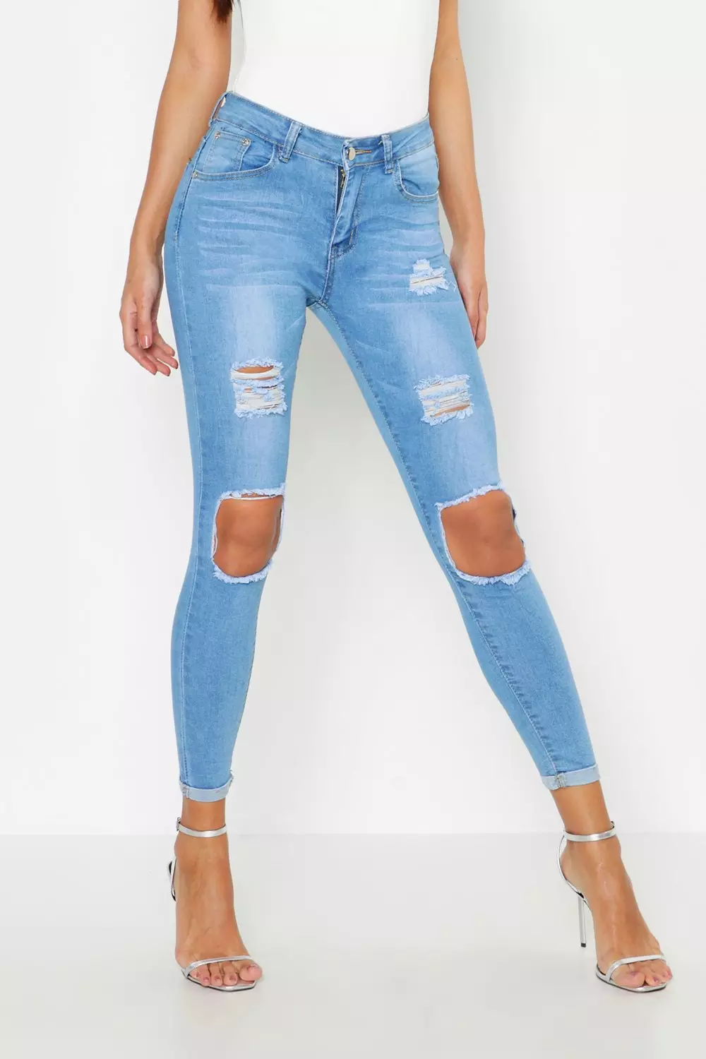 Light wash store distressed skinny jeans